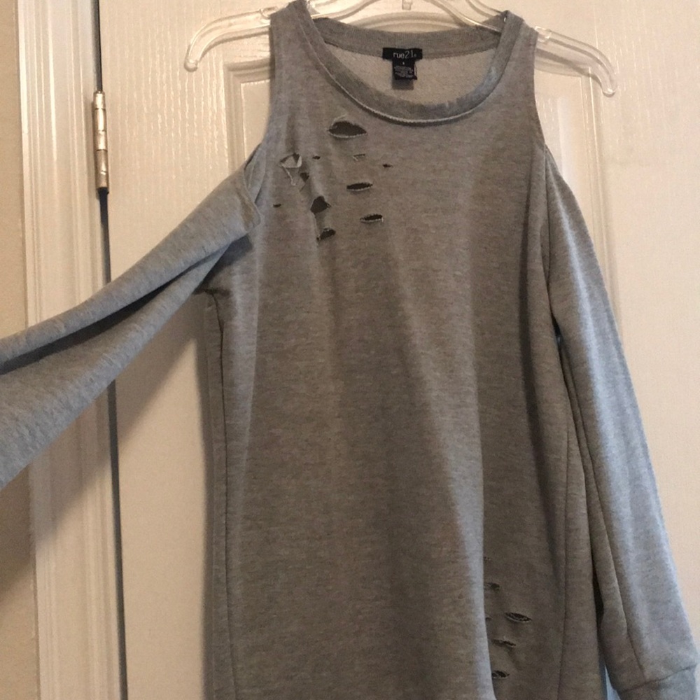 Cold shoulder distressed sweater